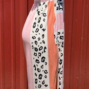 Animal print jumpsuit by Vanilla Monkey, stylish romper with bold animal pattern and fitted design, perfect for casual wear.