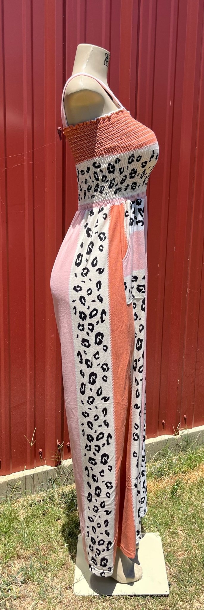 Animal print jumpsuit by Vanilla Monkey, stylish romper with bold animal pattern and fitted design, perfect for casual wear.