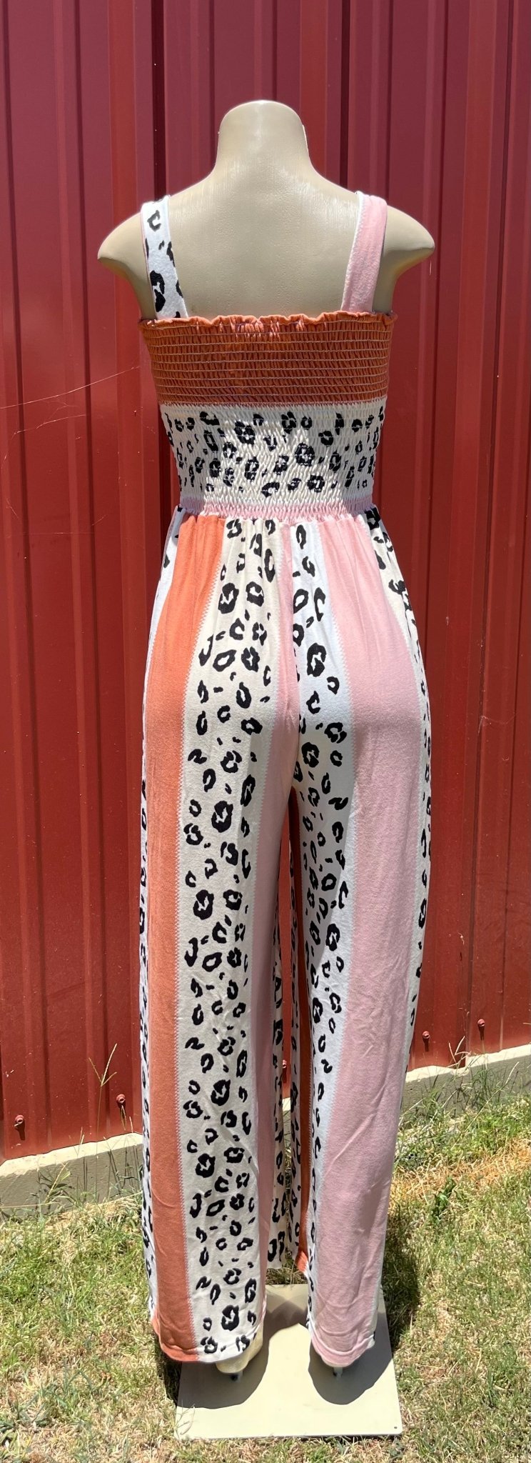 Vanilla Monkey animal print jumpsuit with long sleeves and relaxed fit, perfect for casual wear and stylish comfort.