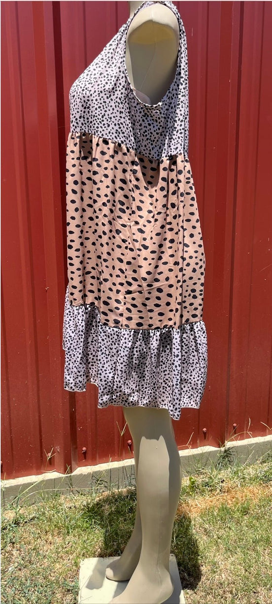 Animal print sleeveless tiered dress by Vanilla Monkey featuring a flowing, layered design perfect for casual or summer wear.