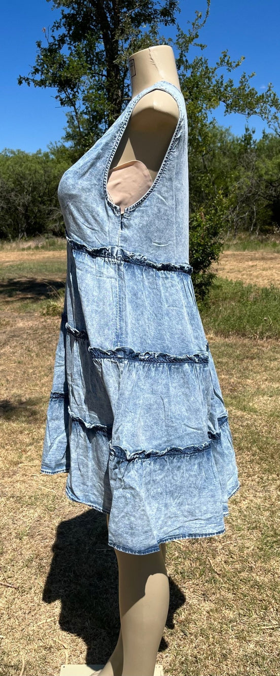 Vanilla Monkey denim sundress featuring adjustable straps and a casual, breezy style perfect for summer days.