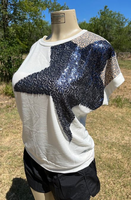 Vanilla Monkey sequins star top featuring shiny sequined star design on a stylish women's blouse.