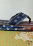 Women's navy flip flops by Very G with USA flag design, featuring comfortable straps and casual summer style.