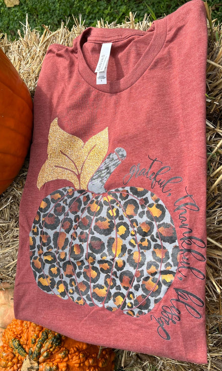 Wandering Owl Designs TGB Leopard Pumpkin top featuring a leopard print pumpkin design on a stylish blouse.