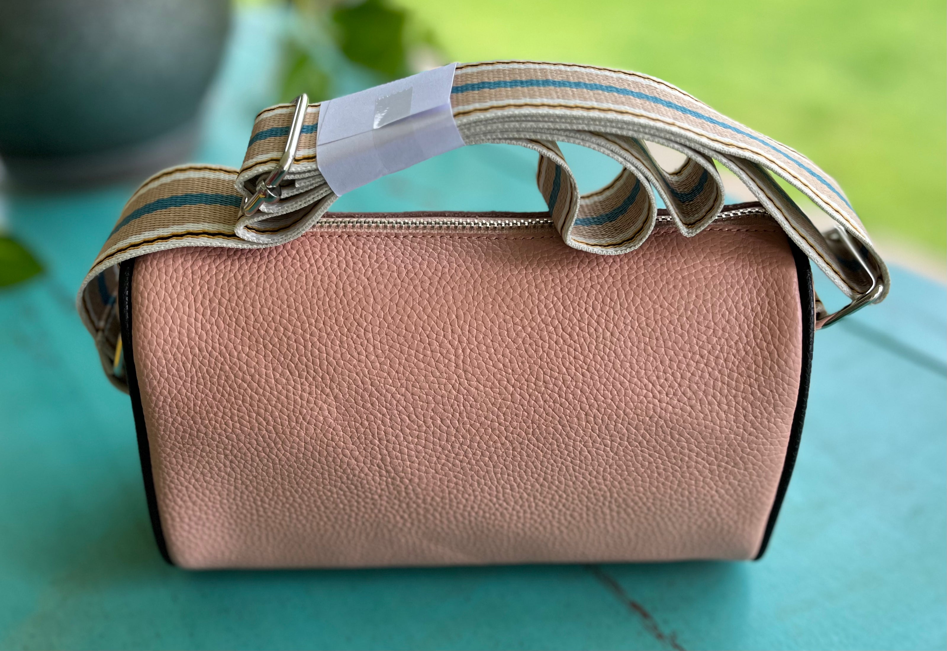 Miss Sparkling crossbody bag with adjustable strap, featuring a stylish design in soft leather with metal accents.