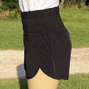 Light gray 42POPS windbreaker track shorts with an elastic waistband and lightweight fabric, designed for athletic wear.
