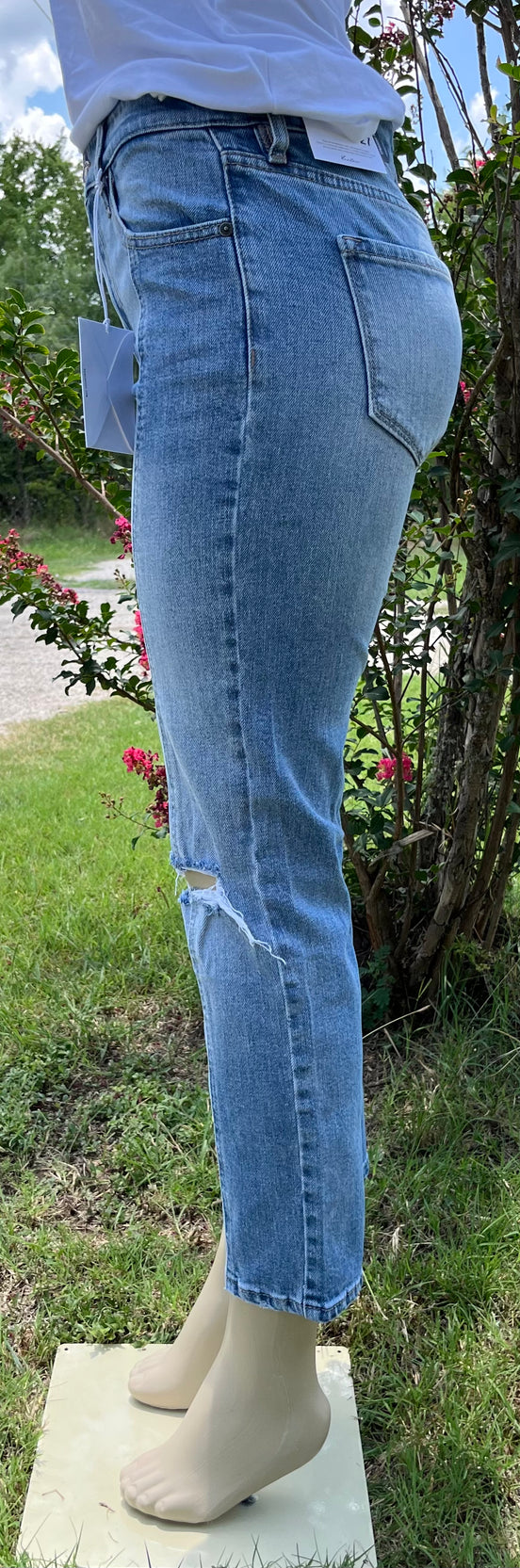 KanCan capris in denim, featuring a slim fit design with classic five-pocket styling and rolled hems.