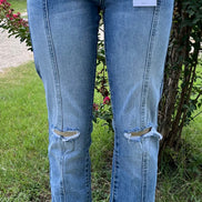 Pair of KanCan capris with a slim fit, featuring classic denim style and visible stitching, perfect for casual wear.