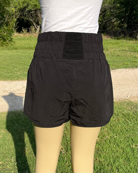 Light gray Windbreaker Track Shorts by 42POPS, featuring a sleek design and elastic waistband suited for athletic wear.