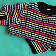 Miss Sparkling fun striped top featuring colorful horizontal stripes and a relaxed fit, perfect for casual wear.