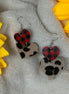 Unishe brand. Silver dangle with small buffalo plaid heart atop a bigger leopard heart. $8