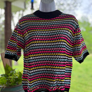 Miss Sparkling Fun Striped Top featuring colorful vertical stripes and a relaxed fit, perfect for casual wear.
