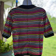 Colorful striped top by Miss Sparkling featuring a stylish design and comfortable fit, shown on a model.