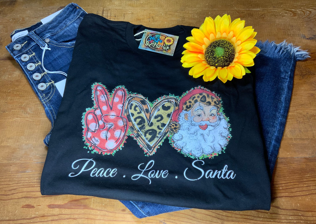 Rebel Rose Peace Love Santa T-shirt featuring festive holiday design, casual fit, and graphic print, perfect for Christmas celebrations.